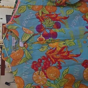 ModaPosa Turquoise dress with print.